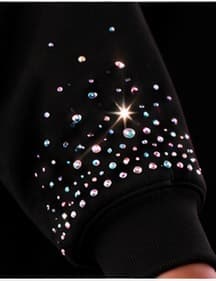Detail of the iridescent rhinestone sleeve burst